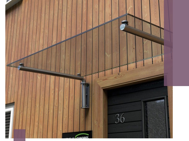 Стеклянные козырьки на входы и фасады в Гае